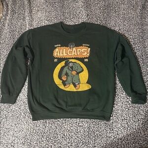 Men’s “ Madvilliany ALLCAPS!” Graphic Green Sweater
